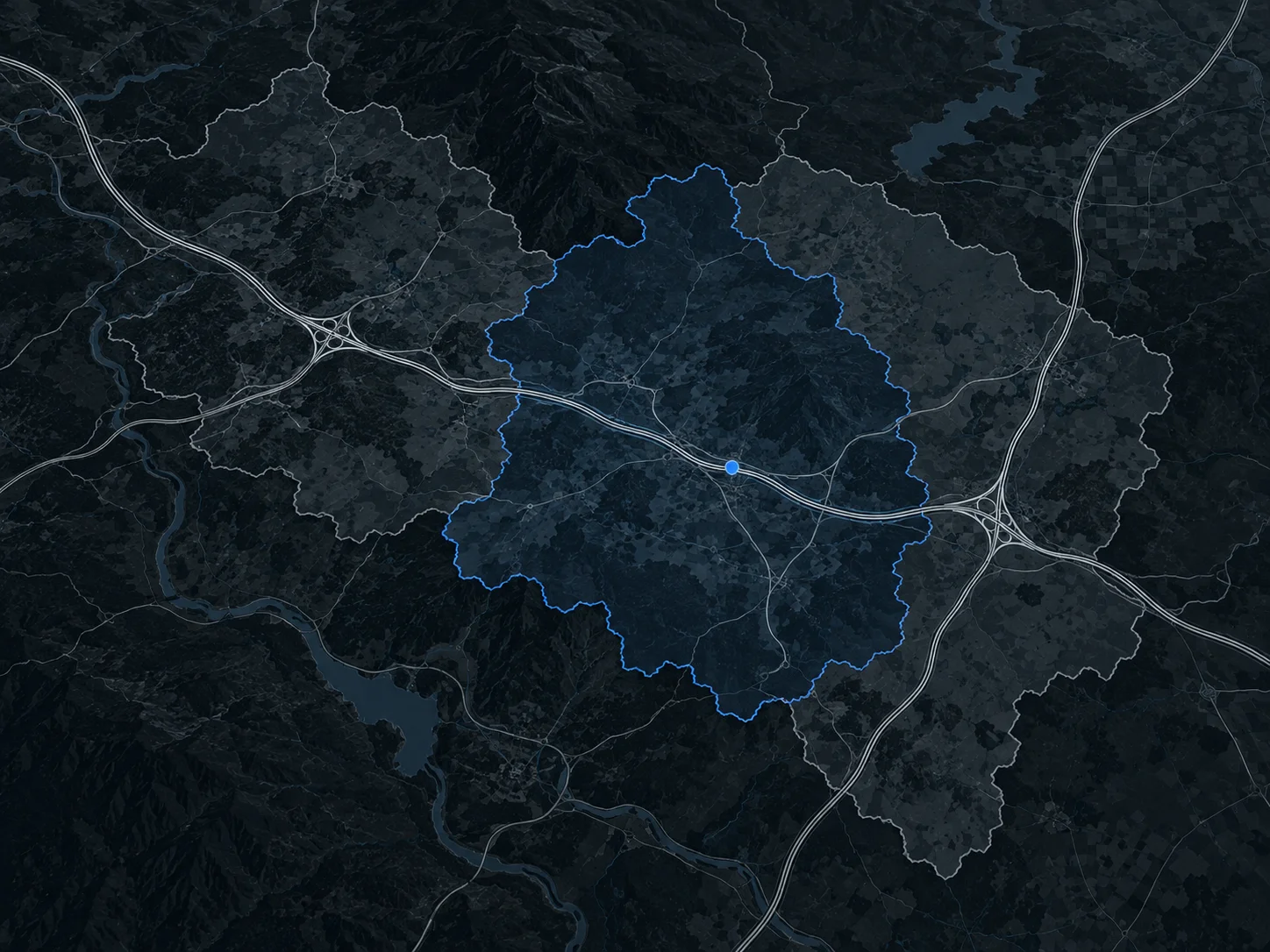 Vextario 4 Dunkle Landkarte mit blau hervorgehobenem Verwaltungsgebiet und einem Standortpunkt an einer Autobahn